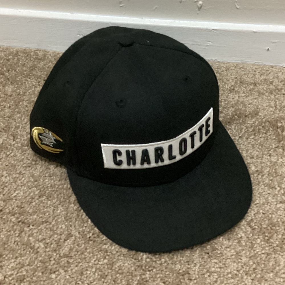 New Era Black Charlotte Patch Snapback Hat with Gold Accent